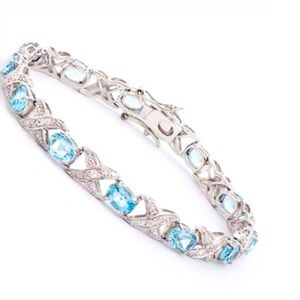 11.30 CTW natural blue topaz and diamonds tennis bracelet